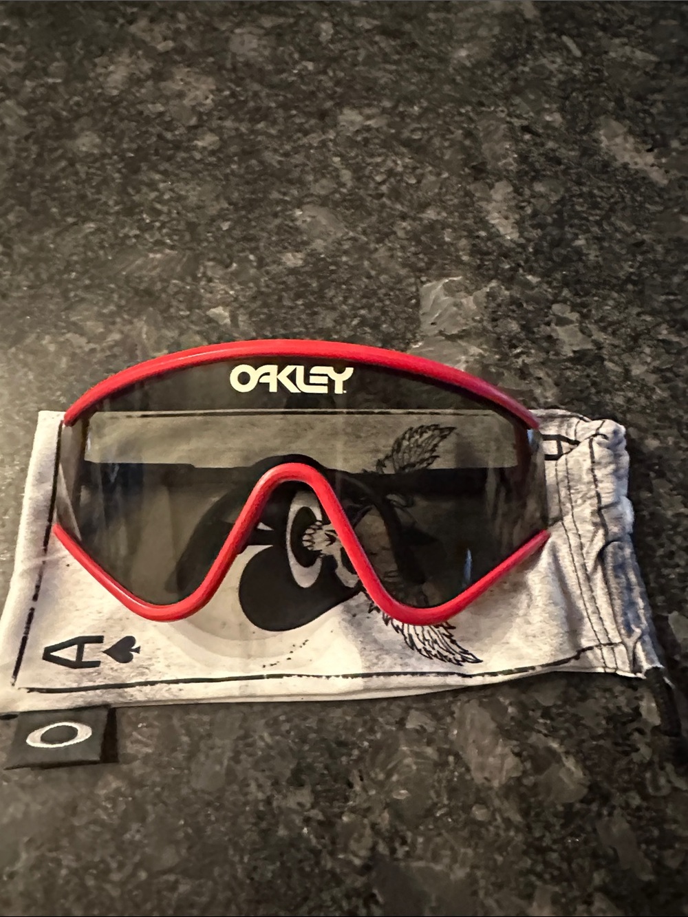 Oakley Shield Goggles with Red Trim and Dark Lens